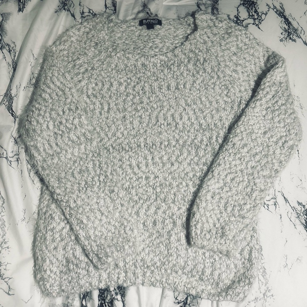 Brand new! It’s a nice fuzzy sweater.